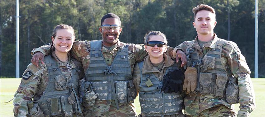 four cadets in uniform